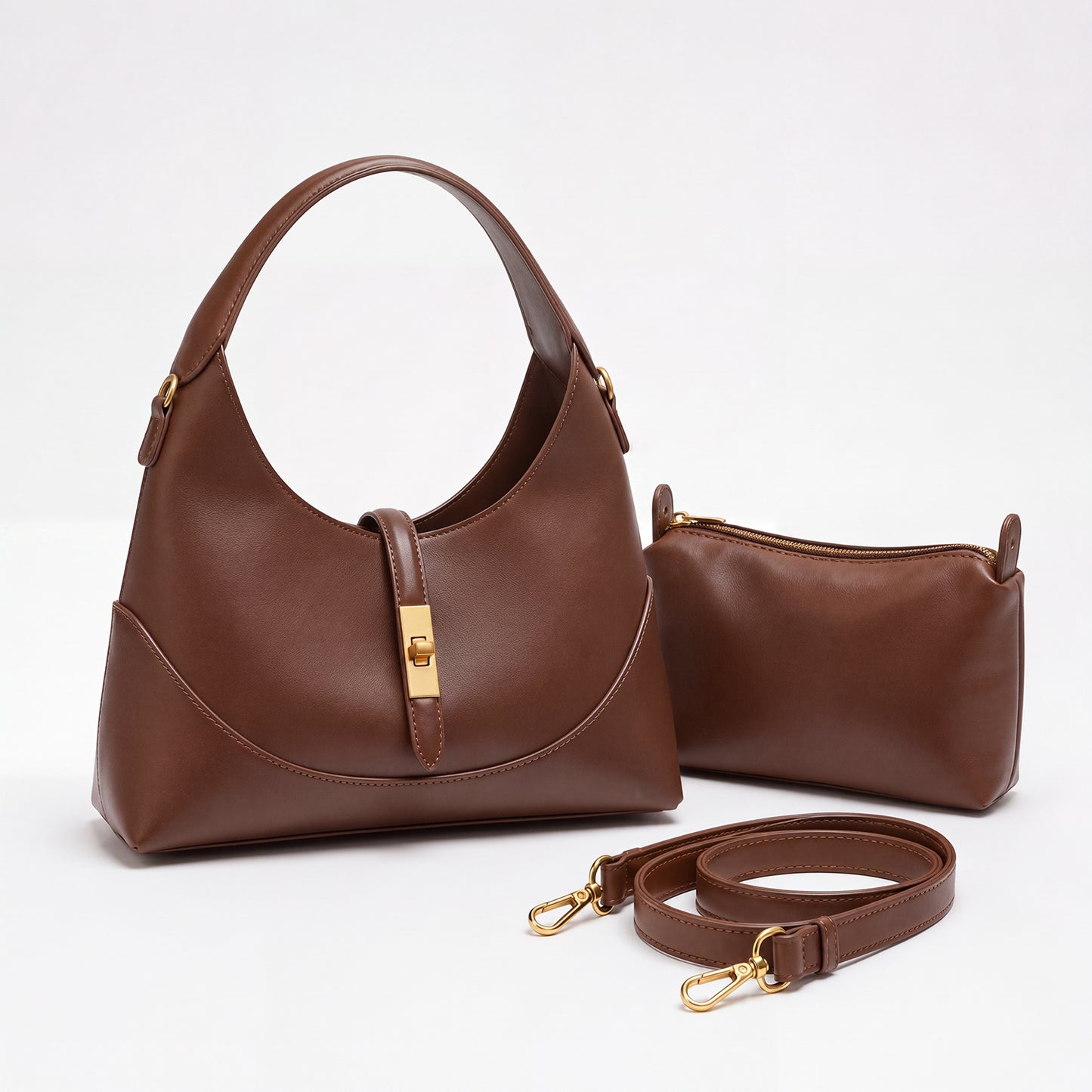 brown compact crescent shoulder bag with pouch and detachable shoulder strap