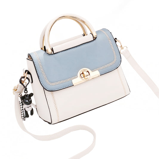 alt
Blue and cream compact women's handbag, front view, with adjustable shoulder strap