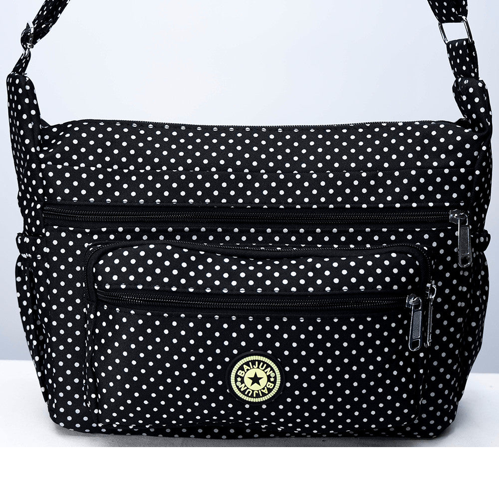 Dollcini Textil Női Válltáska – Könnyű és Divatos Kiegészítő