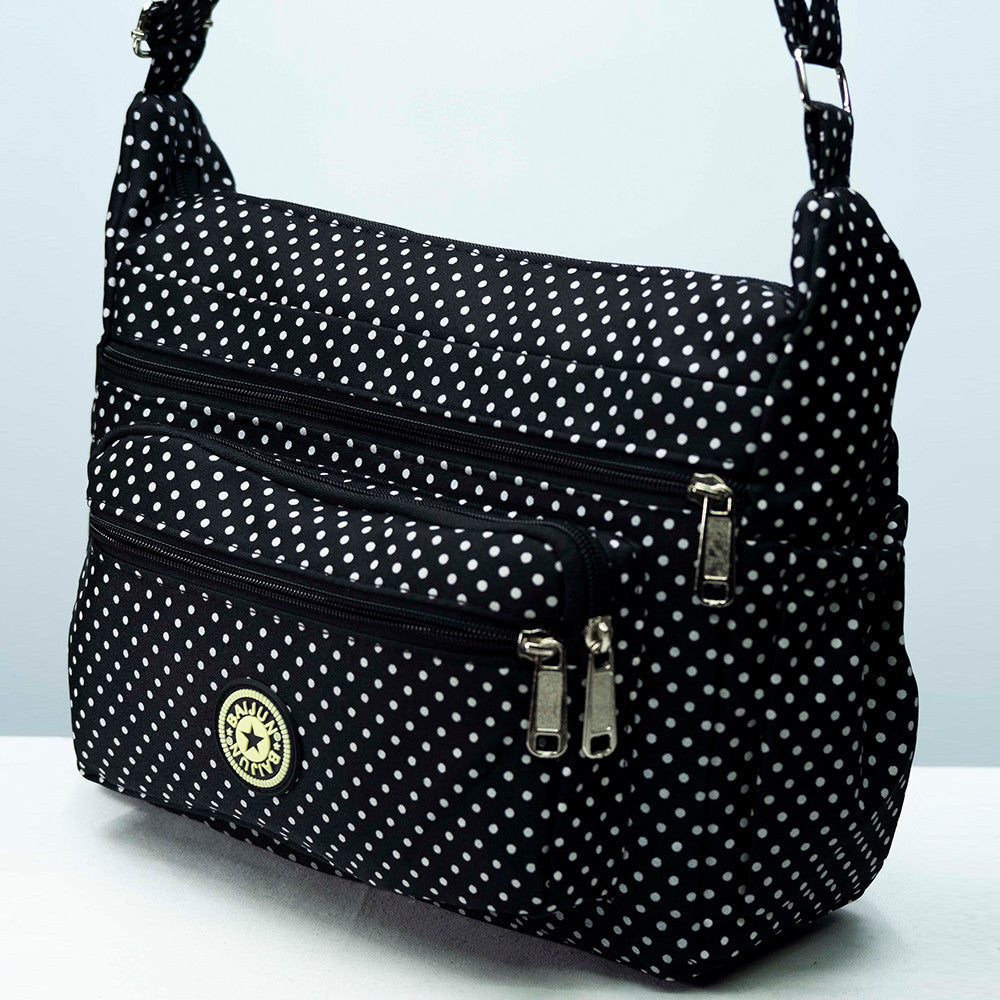 Dollcini Textil Női Válltáska – Könnyű és Divatos Kiegészítő